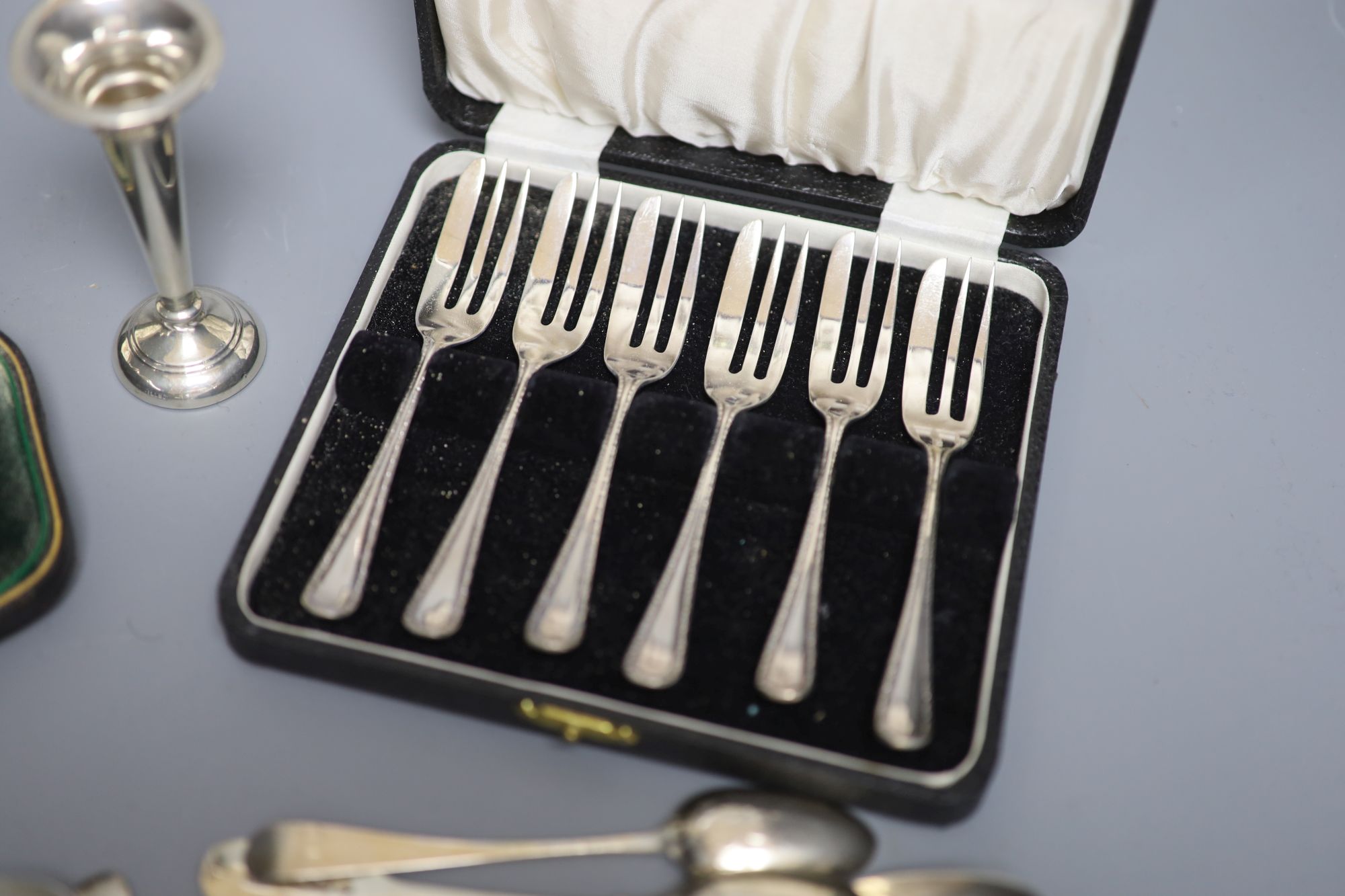 Various silver spoons etc.